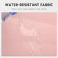 Pink waterproof duffel bag with water-shedding front panel shown