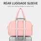 Pink duffel travel bag with rear luggage sleeve and top carry handle