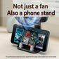 Car phone stand fan, black fan above adjustable phone cradle