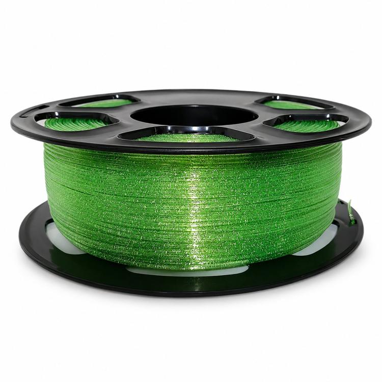 Green glitter PETG filament on black spool reel, shiny sparkle strand texture