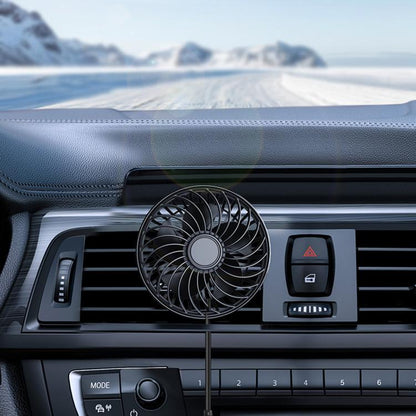 USB mini car fan with circular grille, mounted in dashboard air vent