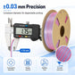 Dual-color metallic PLA filament spool with caliper measuring 1.75mm