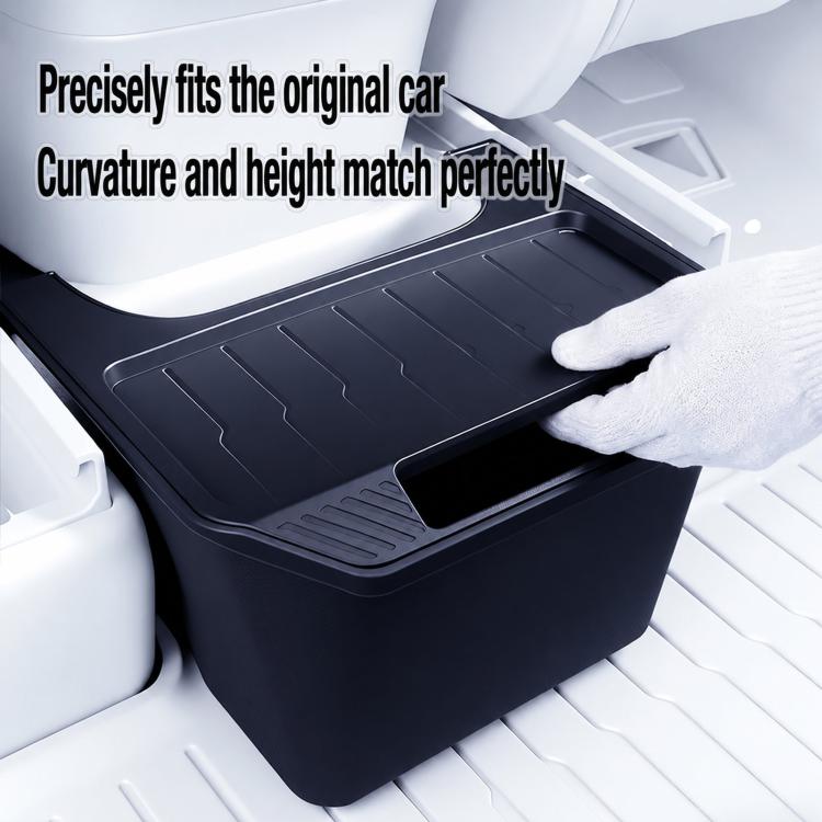 Rear seat storage box with textured tray and raised edges, dark gray