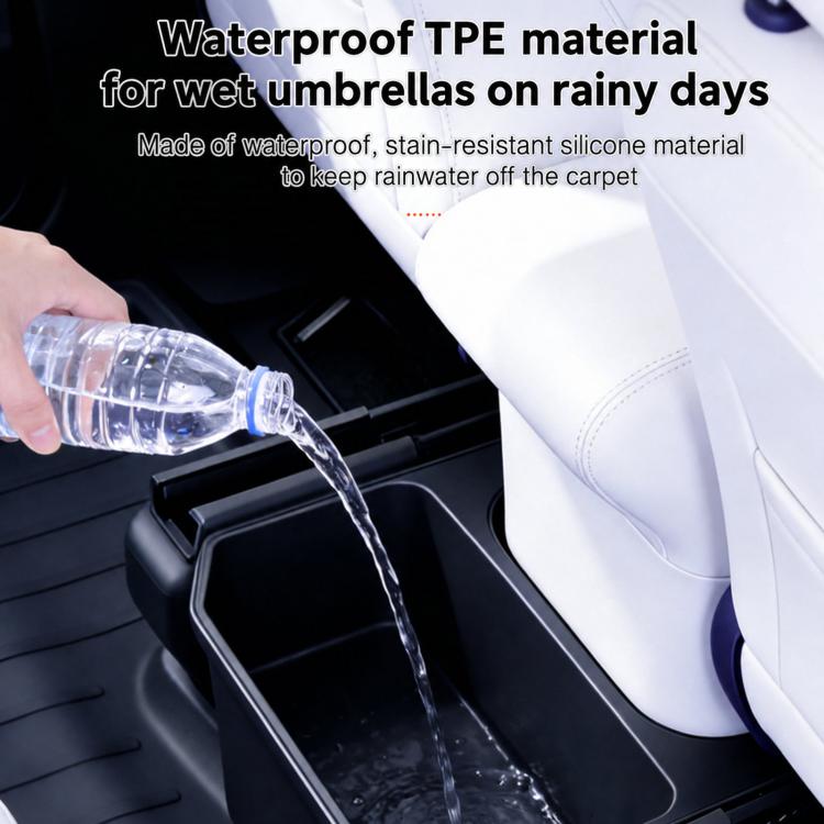 Water-catching rear seat storage box with raised rim and ribbed tray, dark