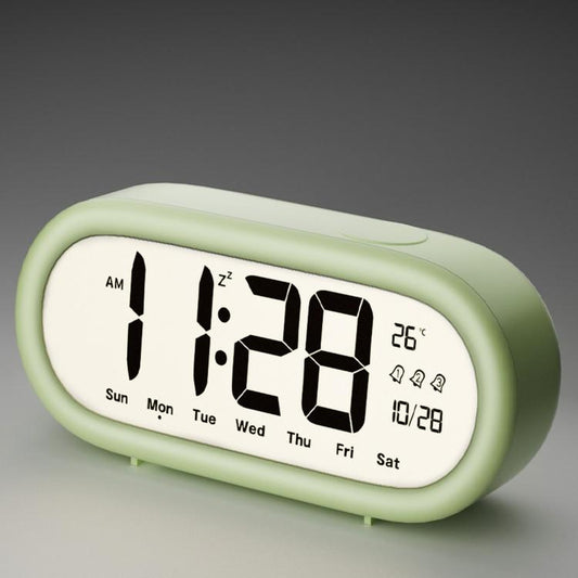 Light green digital alarm clock with large time, date, and temperature display icons
