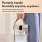 Beige portable humidifier with top handle, shown on a countertop