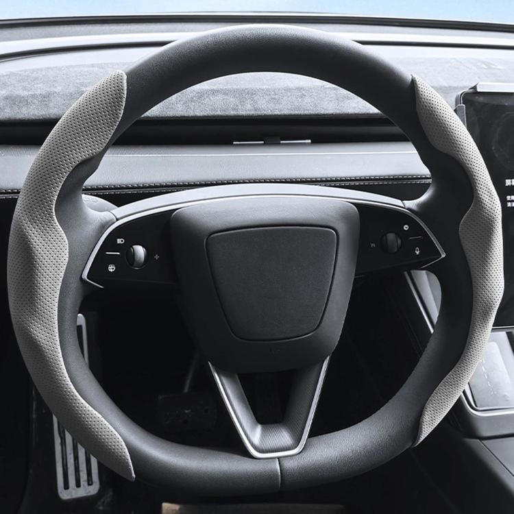 Light gray steering wheel cover with textured grip and stitched edges