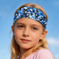 Kids sweat-wicking headband, blue geometric triangles print, wide and snug