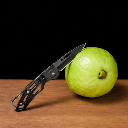 Black folding pocket knife with carabiner keychain, small utility blade