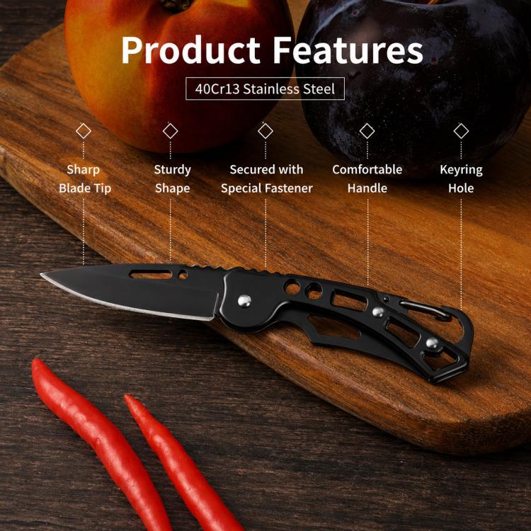 Black folding knife with textured handle and secure latch, utility blade