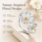 Silver open ring with two textured dogwood flower charms and gold centers