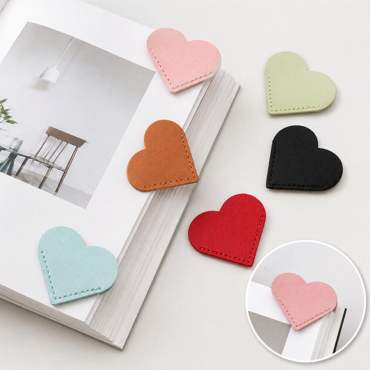 Assorted heart-shaped bookmark corner clips, including pink, green, black, and red