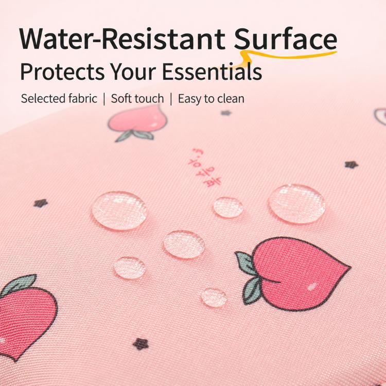 Close-up of pink fabric with peach pattern and water-resistant surface texture.