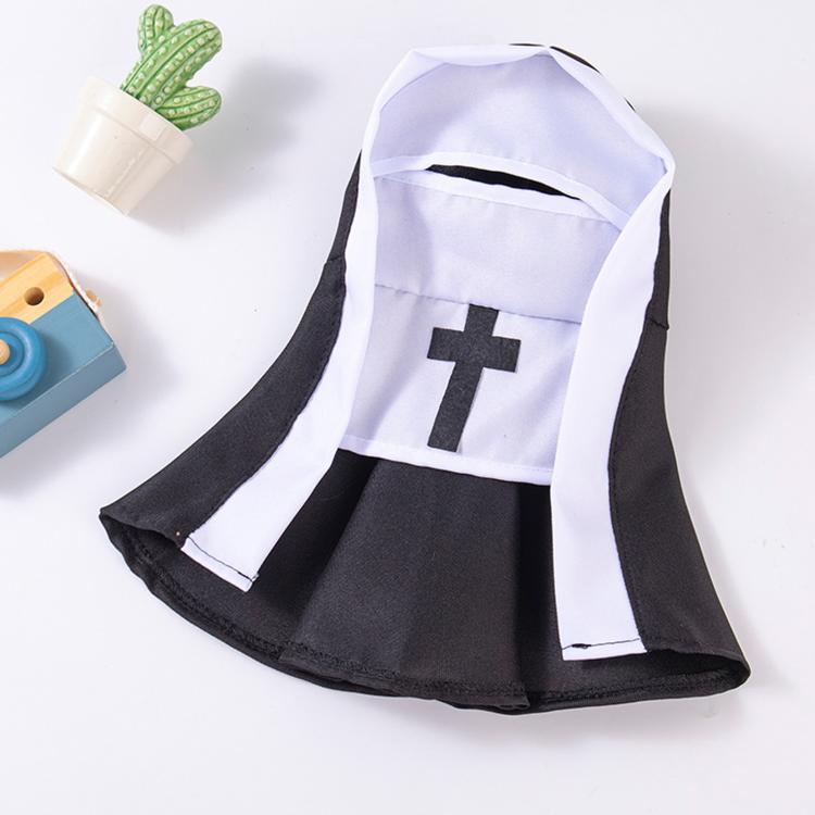 Nun-style pet costume laid flat: white hood and front panel with black cross emblem.