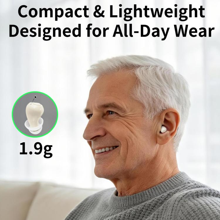 Light beige in-ear hearing aid fitted in an older ear, small discreet design
