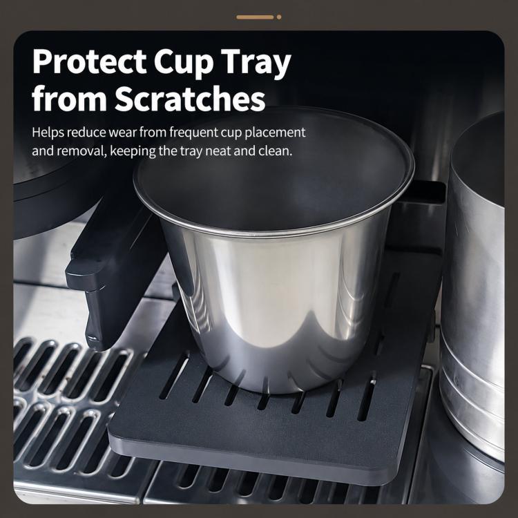 Black cup tray protective cover placed on espresso machine drip tray area