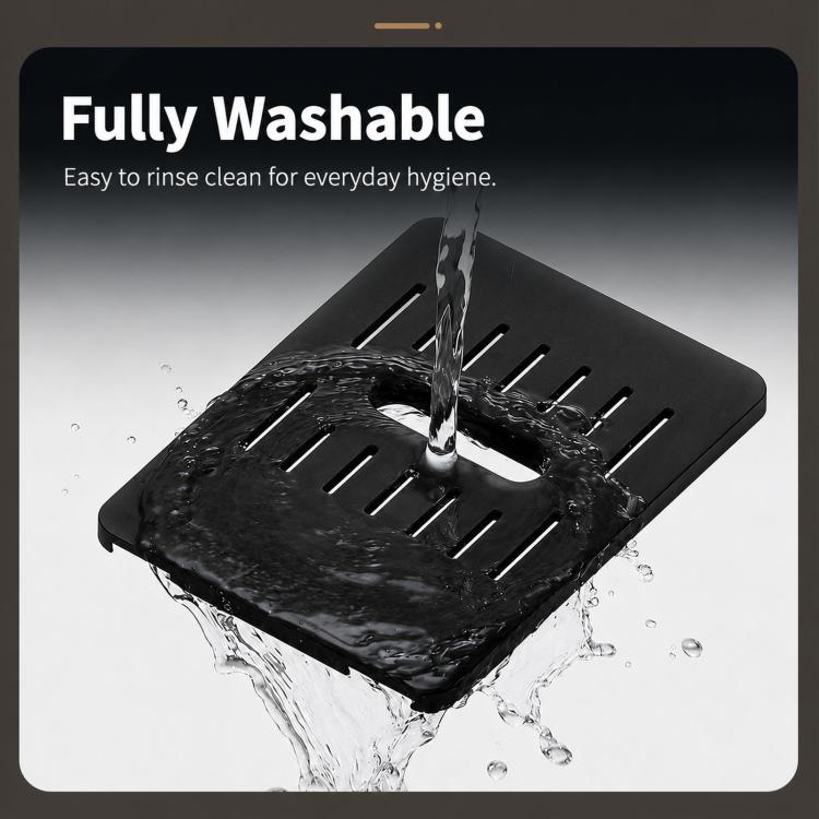 Black washable drip tray protective cover showing water splashes over surface