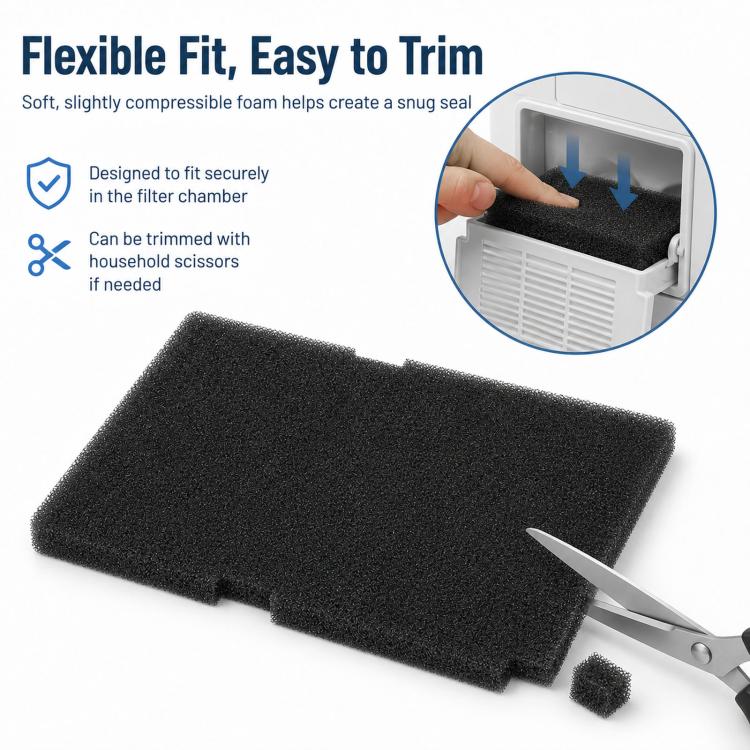 Rectangular black foam filter pad with trim tab, shown with scissors