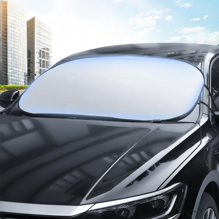 Silver front windshield sunshade fitted over the car windshield, heat reflective