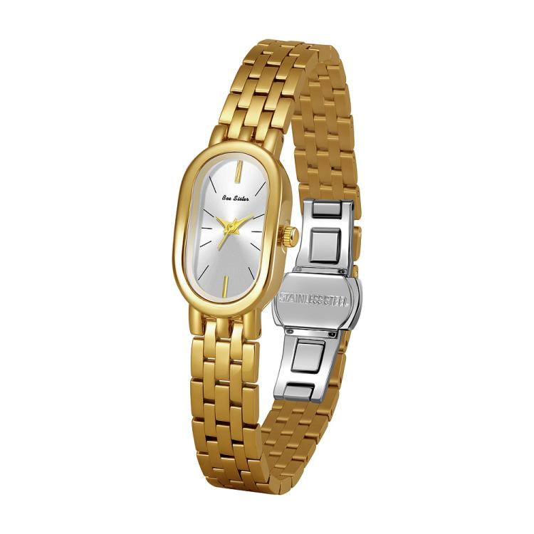 Oval quartz dress watch with gold metal bracelet and pale yellow dial