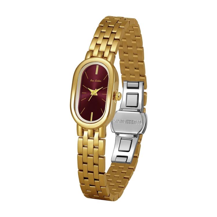 Oval quartz dress watch with gold metal bracelet and burgundy red dial