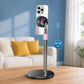 Magnetic phone cooler fan on a desktop stand holding a smartphone upright