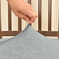 Gray velvet chair seat cover edge, hand adjusting strap buckle