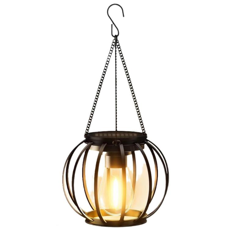 Hanging black metal lantern with vertical glass panels and warm bulb glow