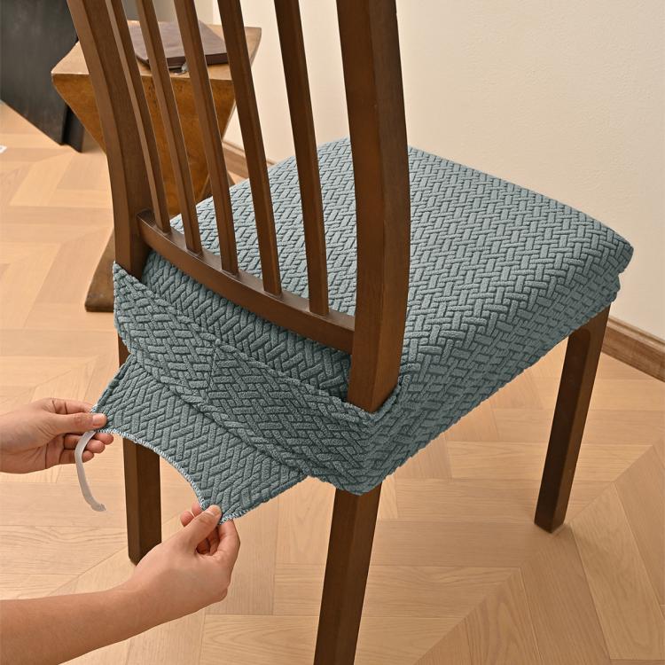 Matcha green textured dining chair seat cover with elastic hem and buckle tabs