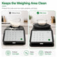 Black silicone weighing area cover on a kitchen scale, helping shield spills
