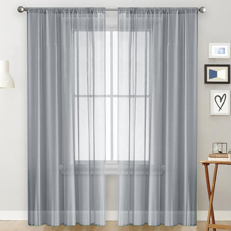 Single sheer light-filtering window curtain in light gray with rod pocket header and grid panels