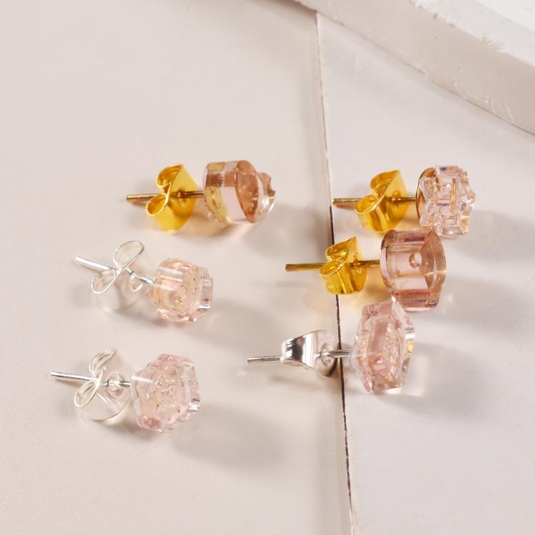 Resin stud earrings with clear and pink-toned pieces and small metal posts