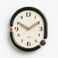 Retro oval wall clock, black frame with beige 3D metal hands and brown hour-marker knob