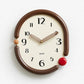 Retro oval wall clock, brown frame with beige 3D metal hands and red side knob