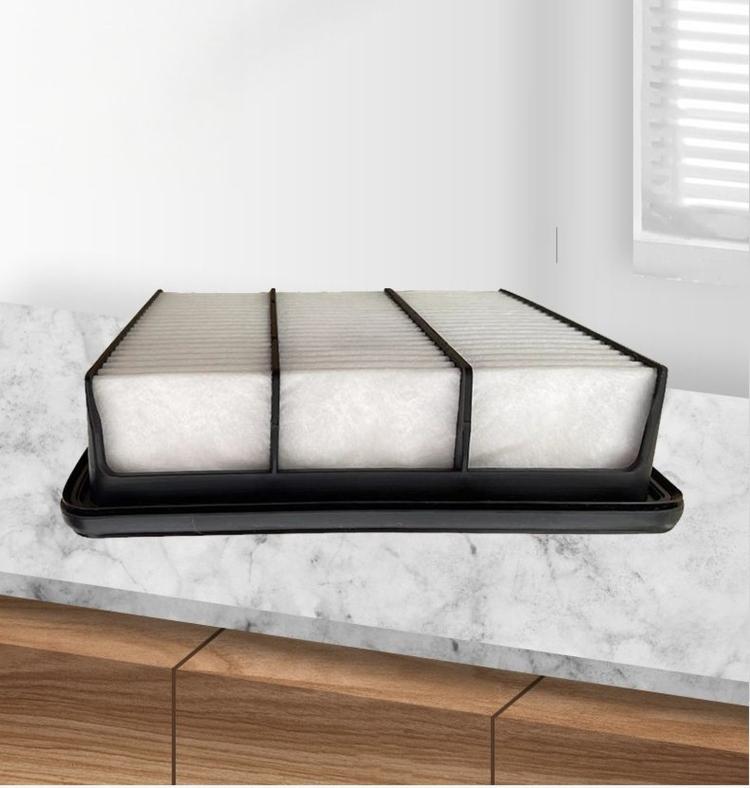 Car air filter with three white pleated panels in a black tray frame
