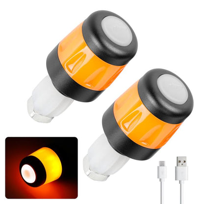 Orange amber bike handlebar end LED light with black rubber housing and clear lens