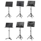 Assorted portable folding music stands in black and white with solid and perforated boards