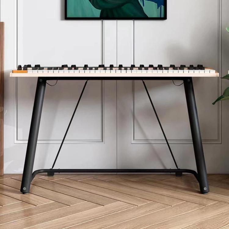 Black U-shaped metal electronic piano stand with four splayed legs