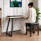 Black U-shaped metal electronic piano stand in use with keyboard