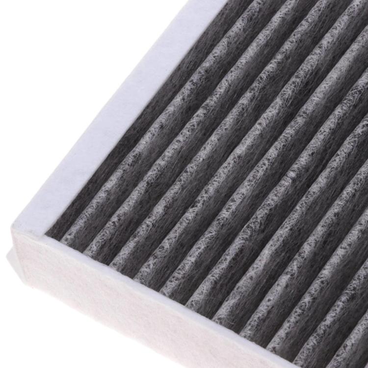 Cabin air filter detail showing dark gray pleated filter folds