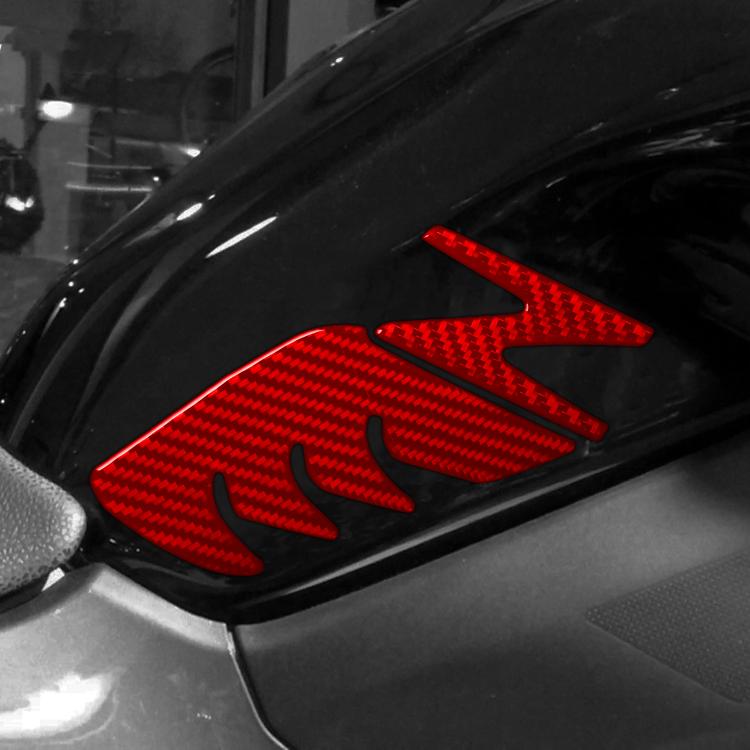 Fuel tank decorative stickers set with red carbon-fiber pattern on motorcycle panel.
