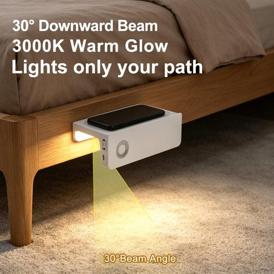 White motion-sensor nightlight sconce with phone shelf, glowing beside bed