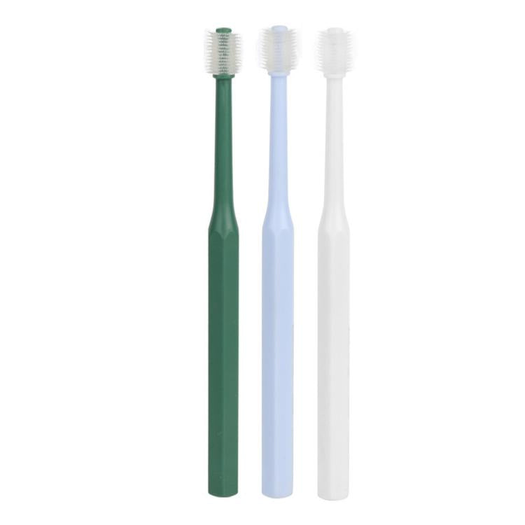 Set of three pet toothbrushes in green, white, and light blue with soft TPE bristles