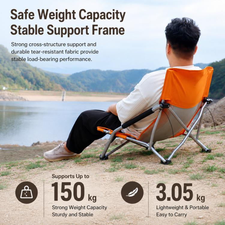 Orange folding beach chair with breathable mesh back and sturdy metal frame