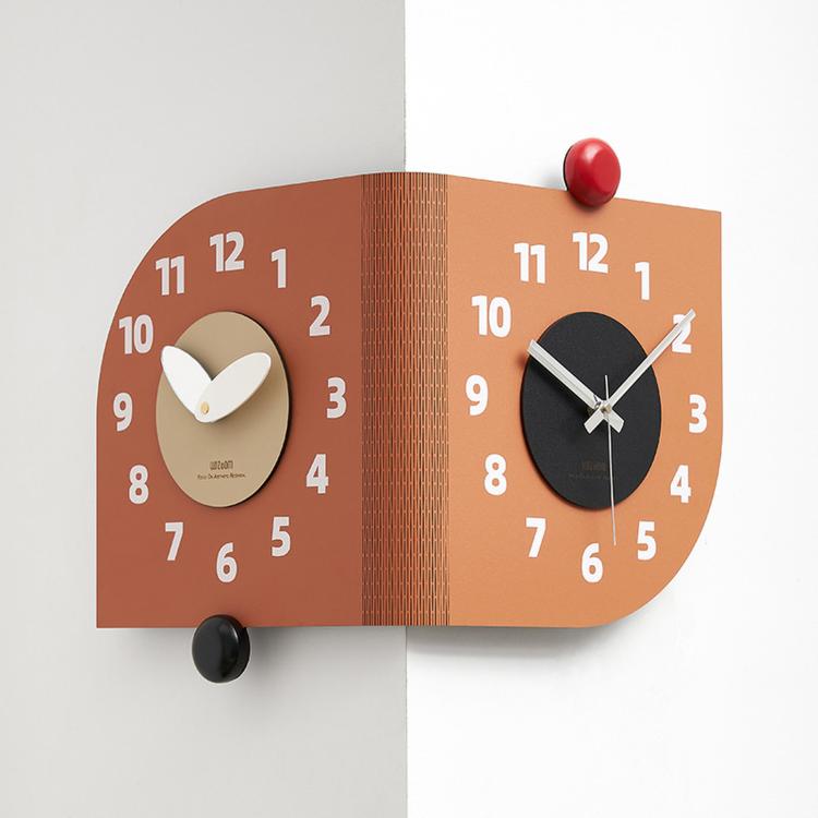 Orange dual-dial corner wall clock with white hands and red and black knobs