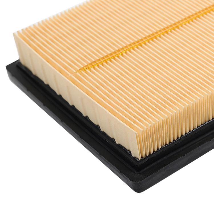 Air filter element close-up of pleated paper folds along black rubber edge
