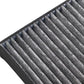Cabin air filter close-up showing pleated gray fibers in black frame