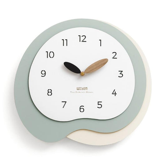 Irregular wall clock with white face, gray-green outer ring, gold and black hands