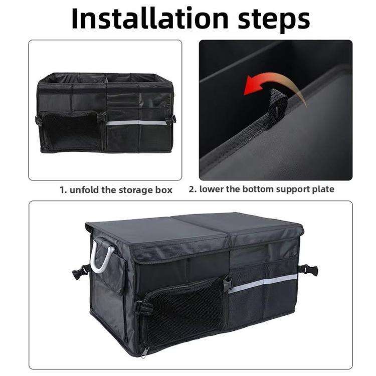 Black trunk storage box with raised bottom support panel and side carry handles