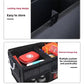 Black trunk storage box with external side storage bag and multiple organizer pockets